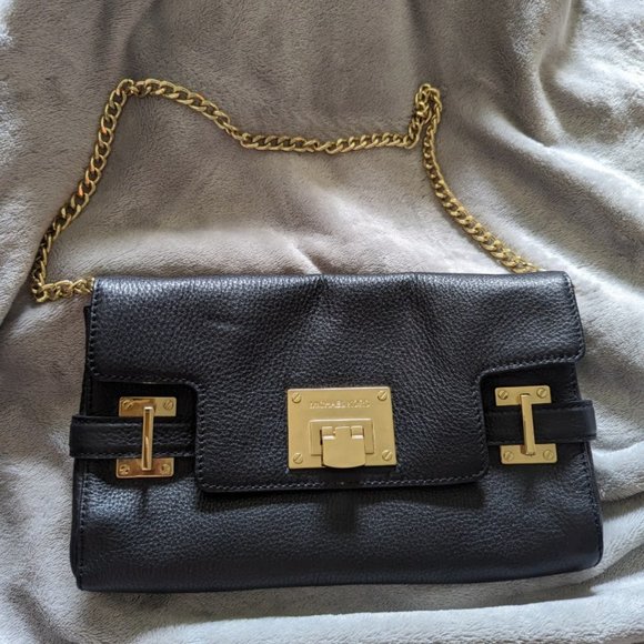 Michael Kors Handbags - Michael Kors black leather clutch